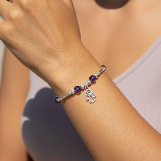 Woman wearing a Angel Charm Amethyst Healing Crystal Women's Sterling Silver Stacking Bracelet by My Silver Wish