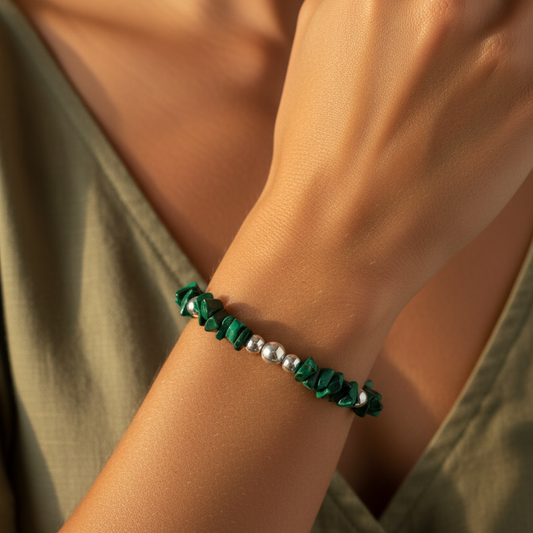 Woman wearing a Malachite healing crystal & sterling silver women's stacking bracelet by My Silver Wish