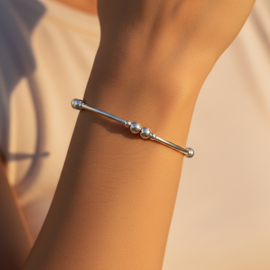 Sterling silver women's stacking filler bracelet on a woman's wrist by My Silver Wish