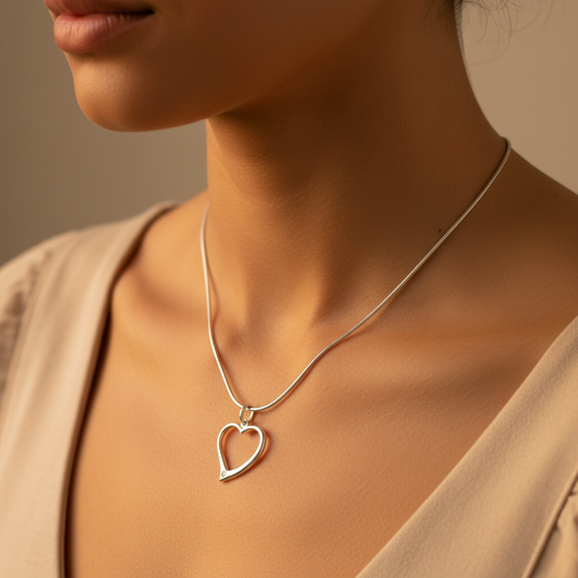 Model wearing a Sterling Silver Necklace with Open Heart Pendant by My Silver Wish