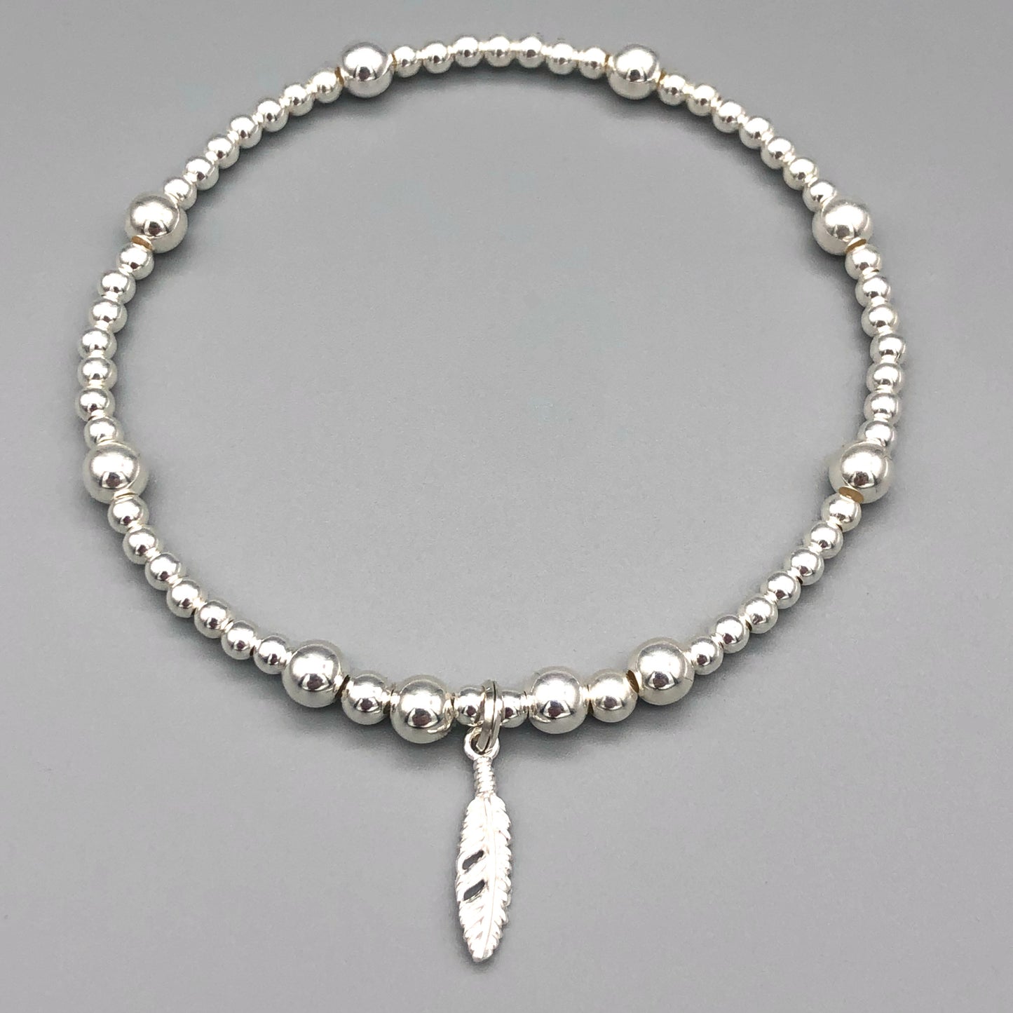 Feather charm girl's 925 sterling silver stacking bracelet by My Silver Wish