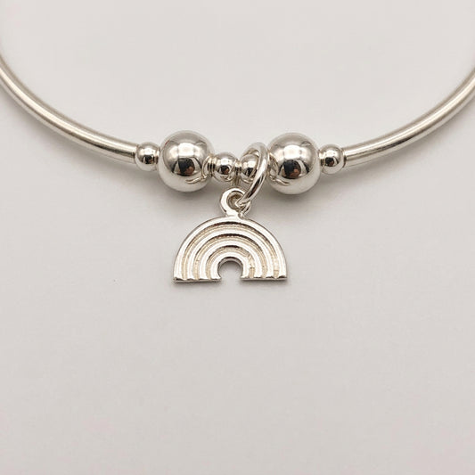 Closeup of Rainbow Women's Sterling Silver Stacking Charm Bracelet by My Silver Wish
