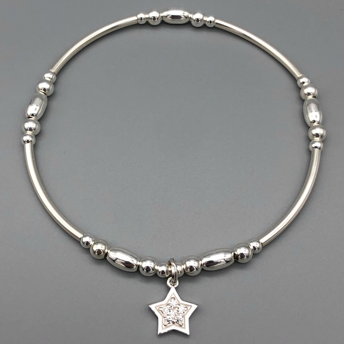 Star charm sterling silver stacking charm bracelet by My Silver Wish