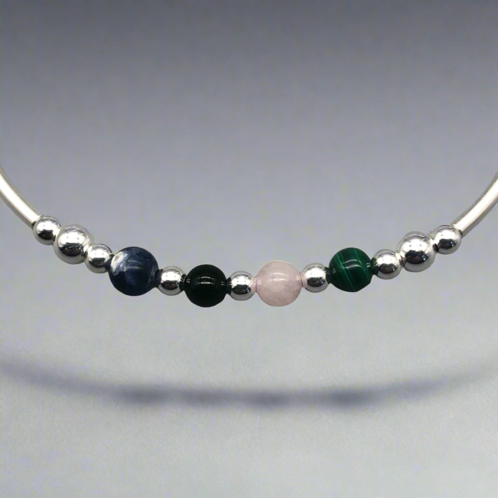 Closeup of Anxiety support healing crystal sterling silver women's stacking charm bracelet by My Silver Wish