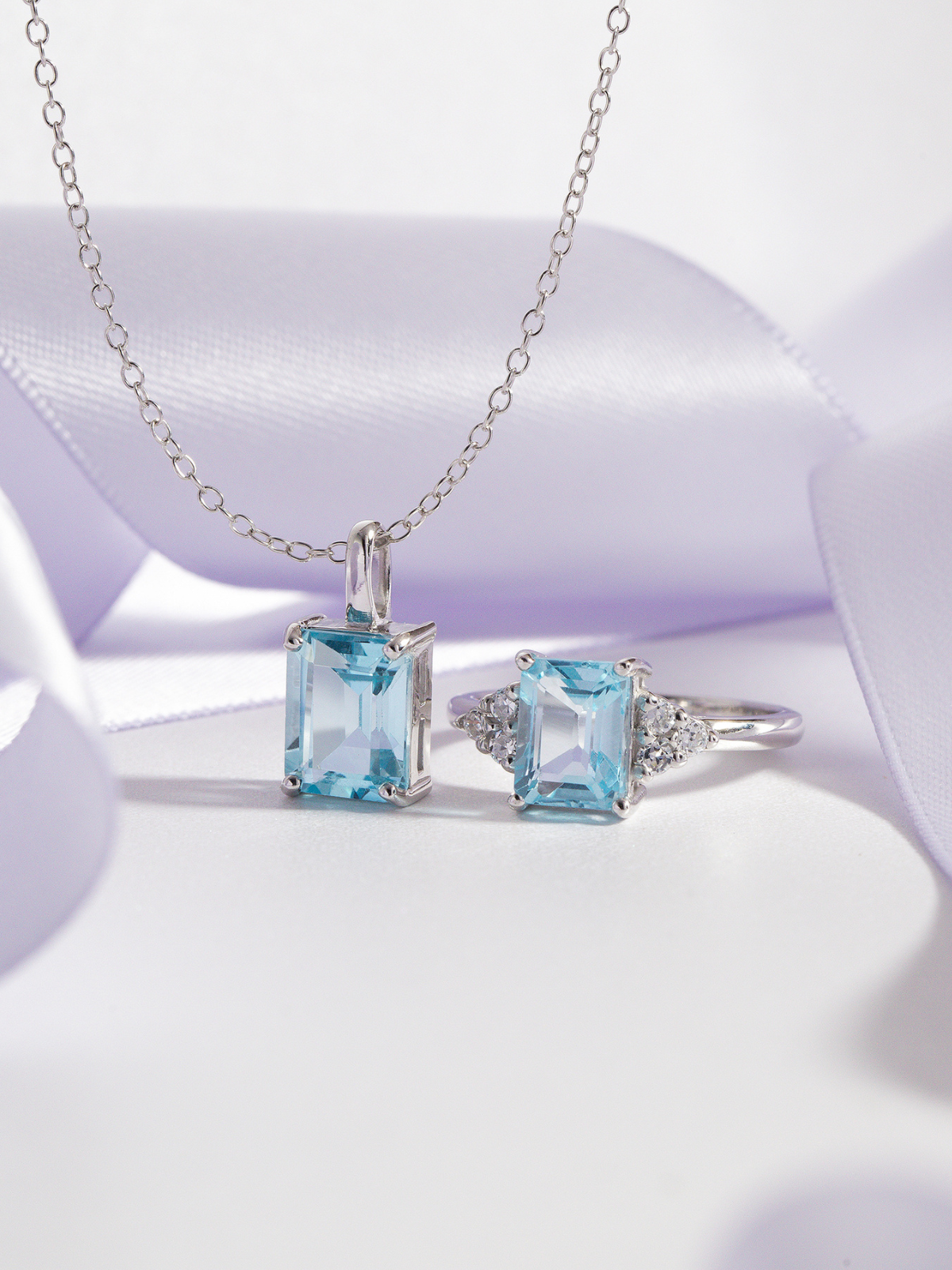 Blue Topaz Emerald Cut Pendant Necklace in Sterling Silver