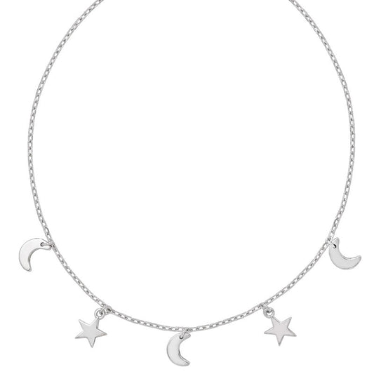 Silver necklace with moon and star charms on a white background