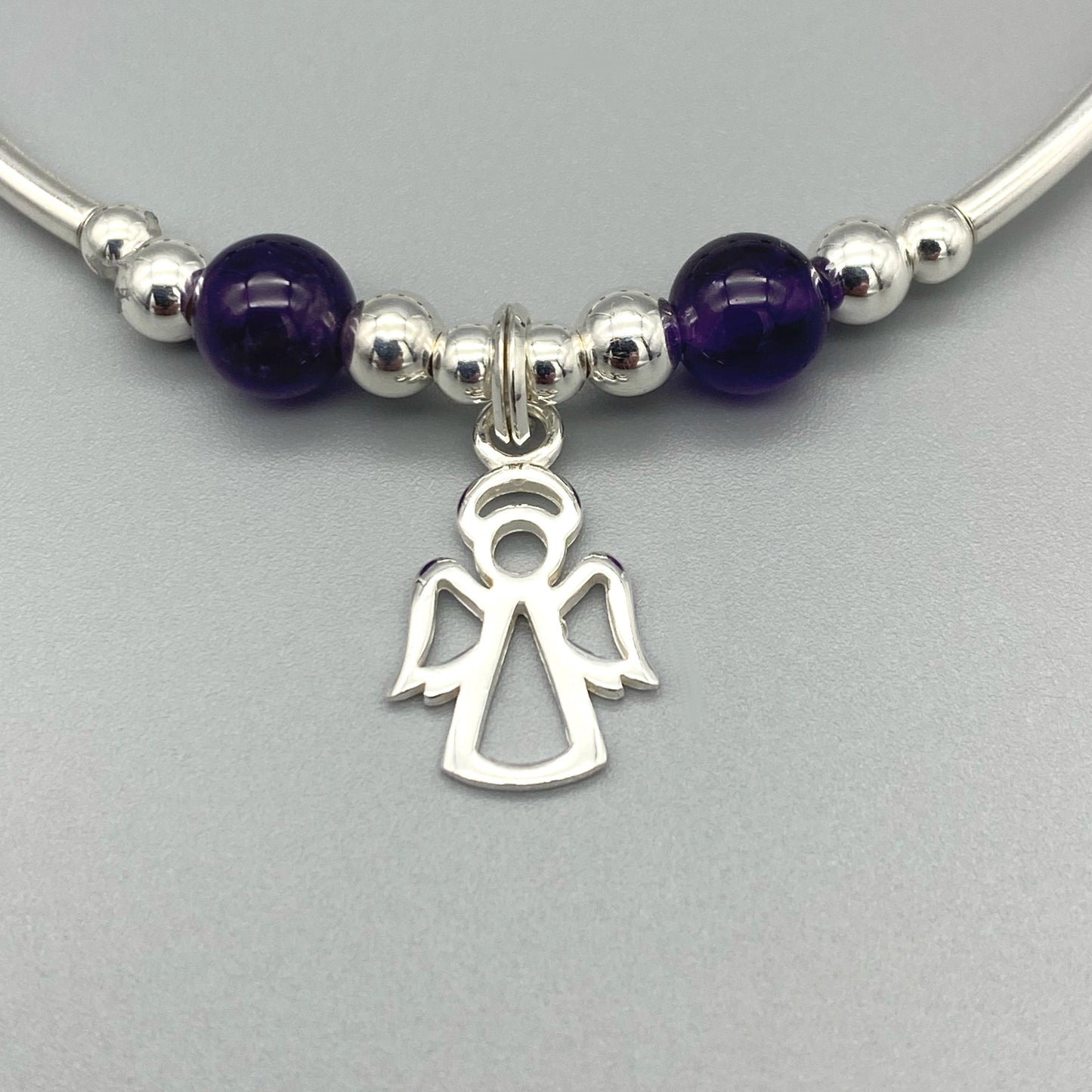 Closeup of Angel Charm Amethyst Healing Crystal Women's Sterling Silver Stacking Bracelet by My Silver Wish
