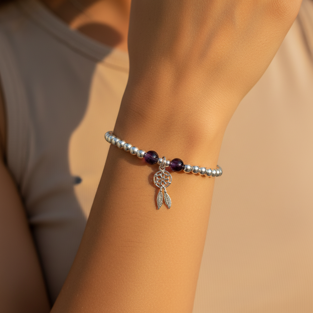 Woman wearing a Dream Catcher Charm & Amethyst Crystal Beads Sterling Silver Stacking bracelet by My Silver Wish