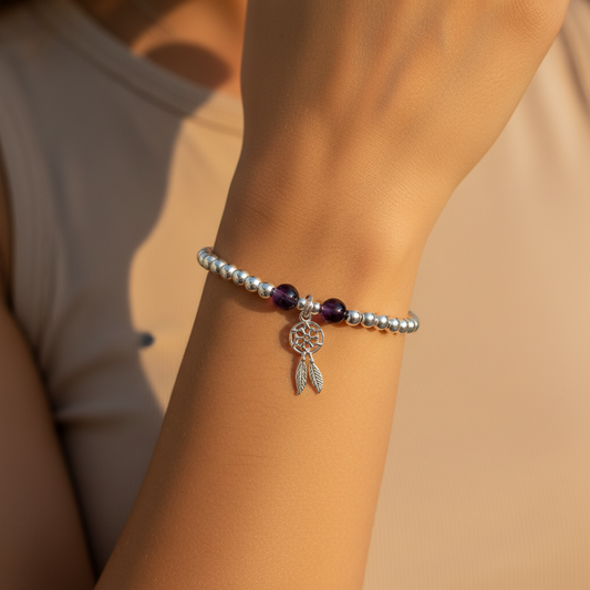 Woman wearing a Dream Catcher Charm & Amethyst Crystal Beads Sterling Silver Stacking bracelet by My Silver Wish