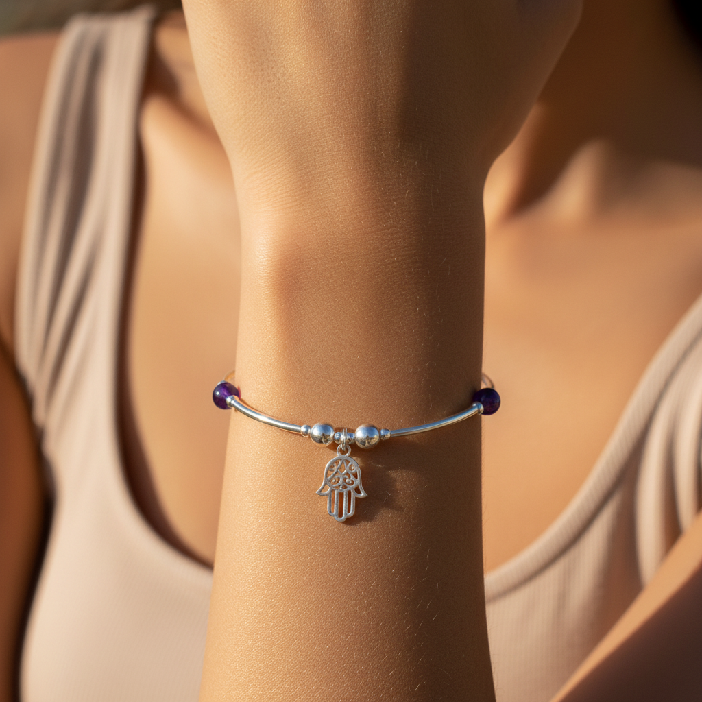 Model wearing a Hamsa Hand Charm Amethyst Healing Crystal Sterling Silver Women's Stacking Bracelet by My Silver Wish