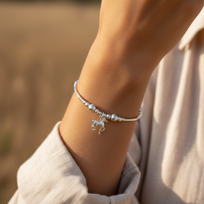 Model wearing a Horse charm sterling silver stacking bracelet for her by My Silver Wish