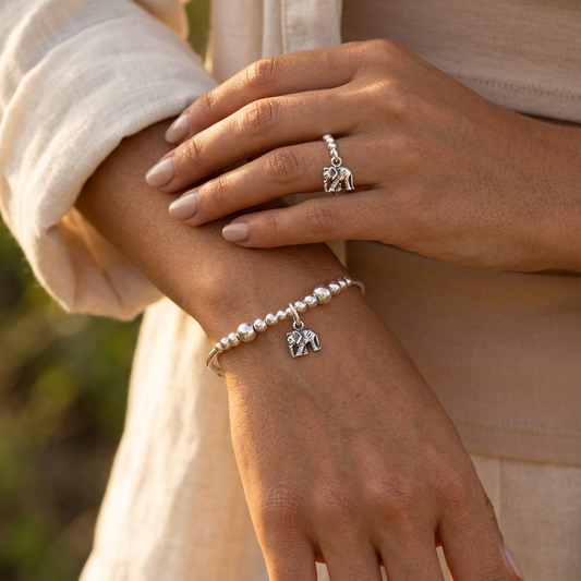 Model wearing a Model wearing a Elephant charm sterling silver women's stacking bracelet & stack ring set by My Silver Wish