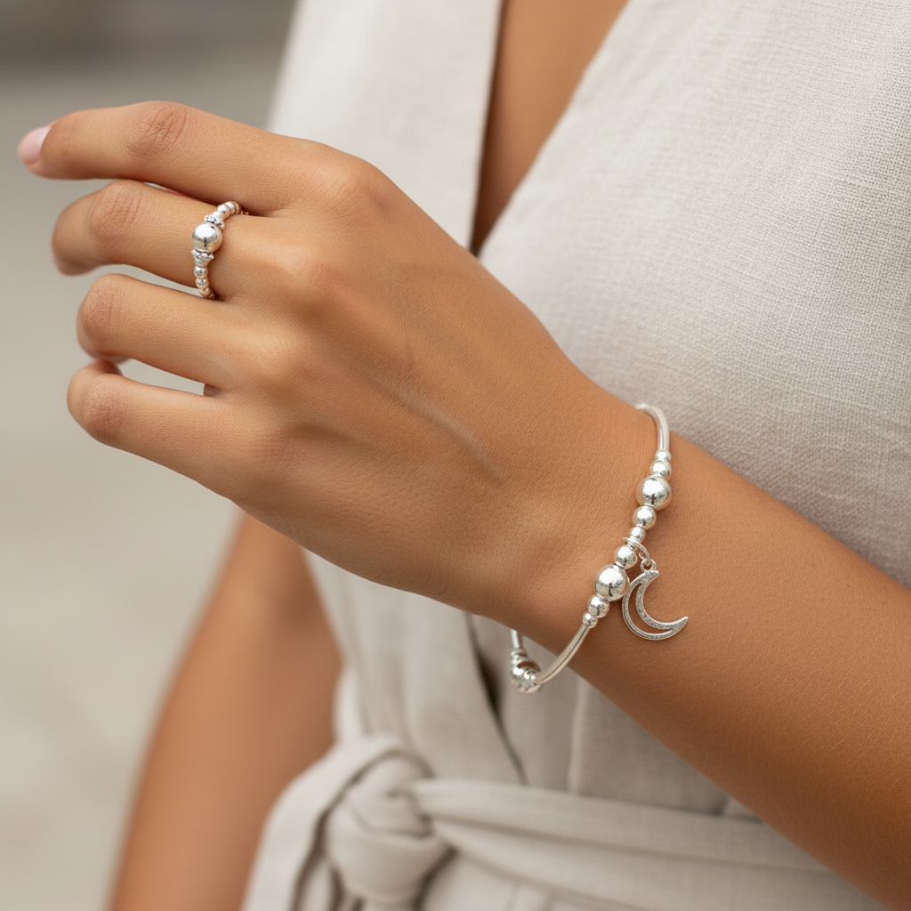 Model wearing a Moon charm sterling silver stacking bracelet & ring jewellery gift set for her by My Silver Wish