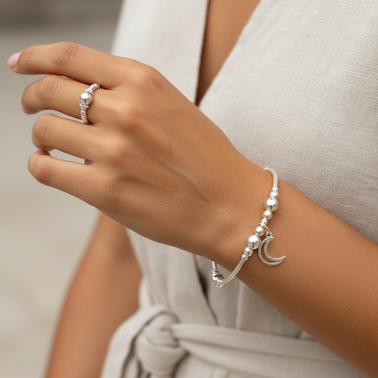 Model wearing a Moon charm sterling silver stacking bracelet & ring jewellery gift set for her by My Silver Wish