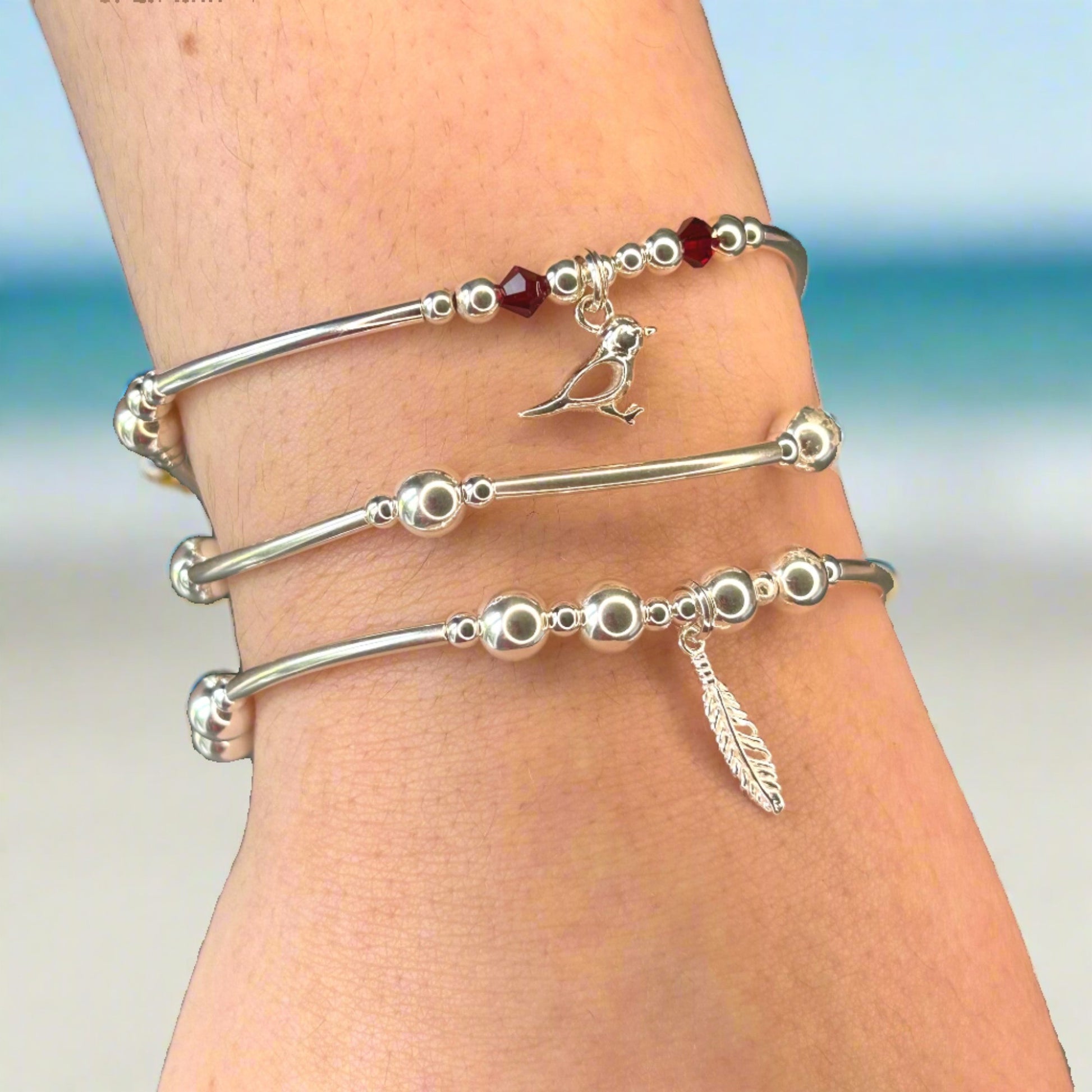 Loved Ones are Near when Feathers and Robins are Near, silver stacking bracelet set by My Silver Wish