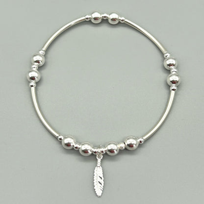 Feather charm silver stacking bracelet by My Silver Wish