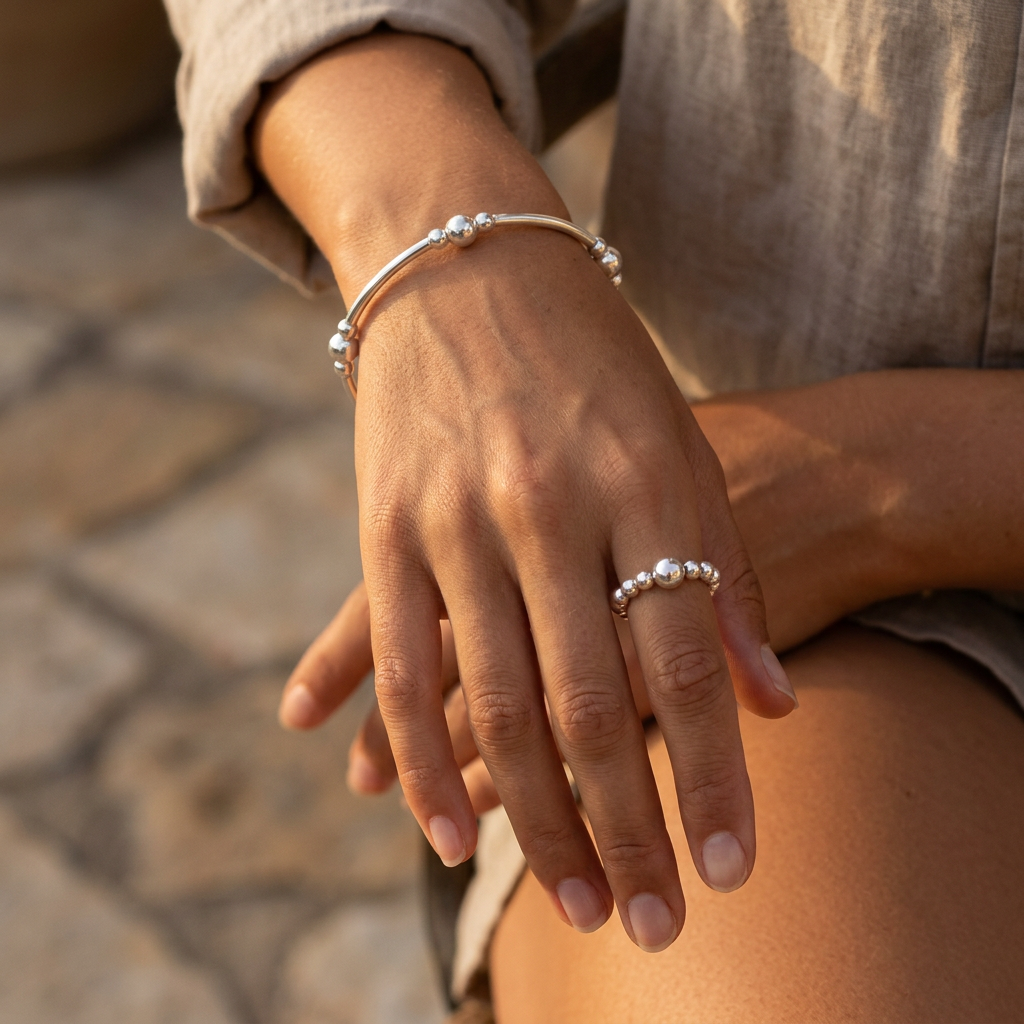 Model wearing a Stack filler sterling silver women's bracelet and ring set by My Silver Wish