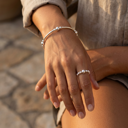 Model wearing a Stack filler sterling silver women's bracelet and ring set by My Silver Wish
