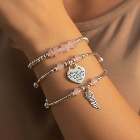 Model wearing a Rose Quartz "Mother Daughter Friends Forever" Women's Sterling Silver Stacking Bracelet Set by My Silver Wish