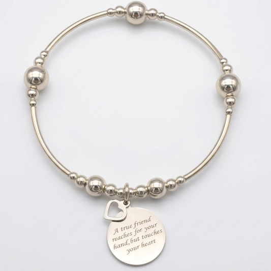 "A true friend reaches for your hand, but touches your heart" women's sterling silver stacking bracelet by My Silver Wish