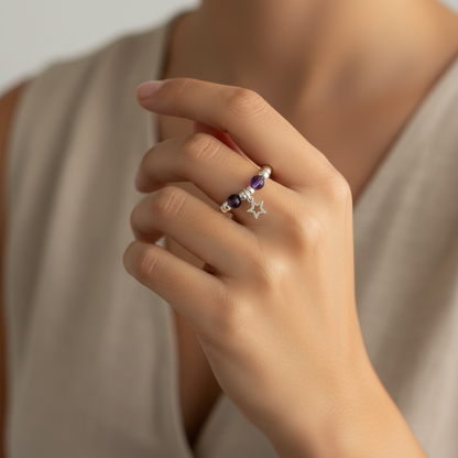 Model wearing a Star charm amethyst sterling silver charm women's bead stacking ring by My Silver Wish