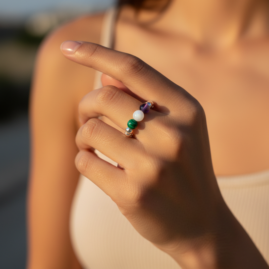 Woman wearing a International Women's Day sterling silver bead stacking ring by My Silver Wish