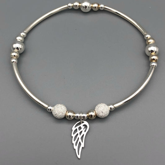 Angel wing charm women's sterling silver stacking bracelet by My Silver Wish
