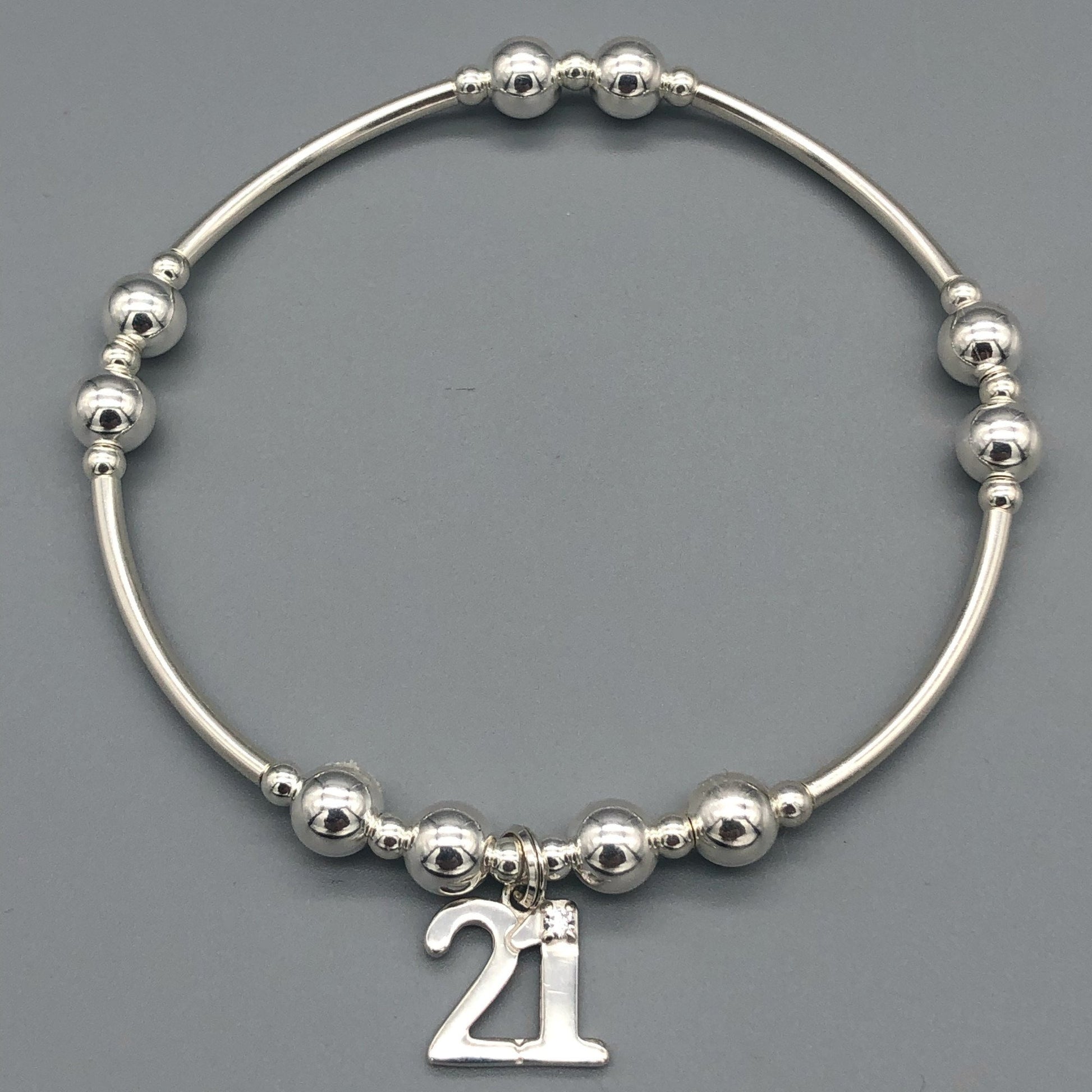 21st Birthday charm women's sterling silver stacking bracelet by My Silver Wish