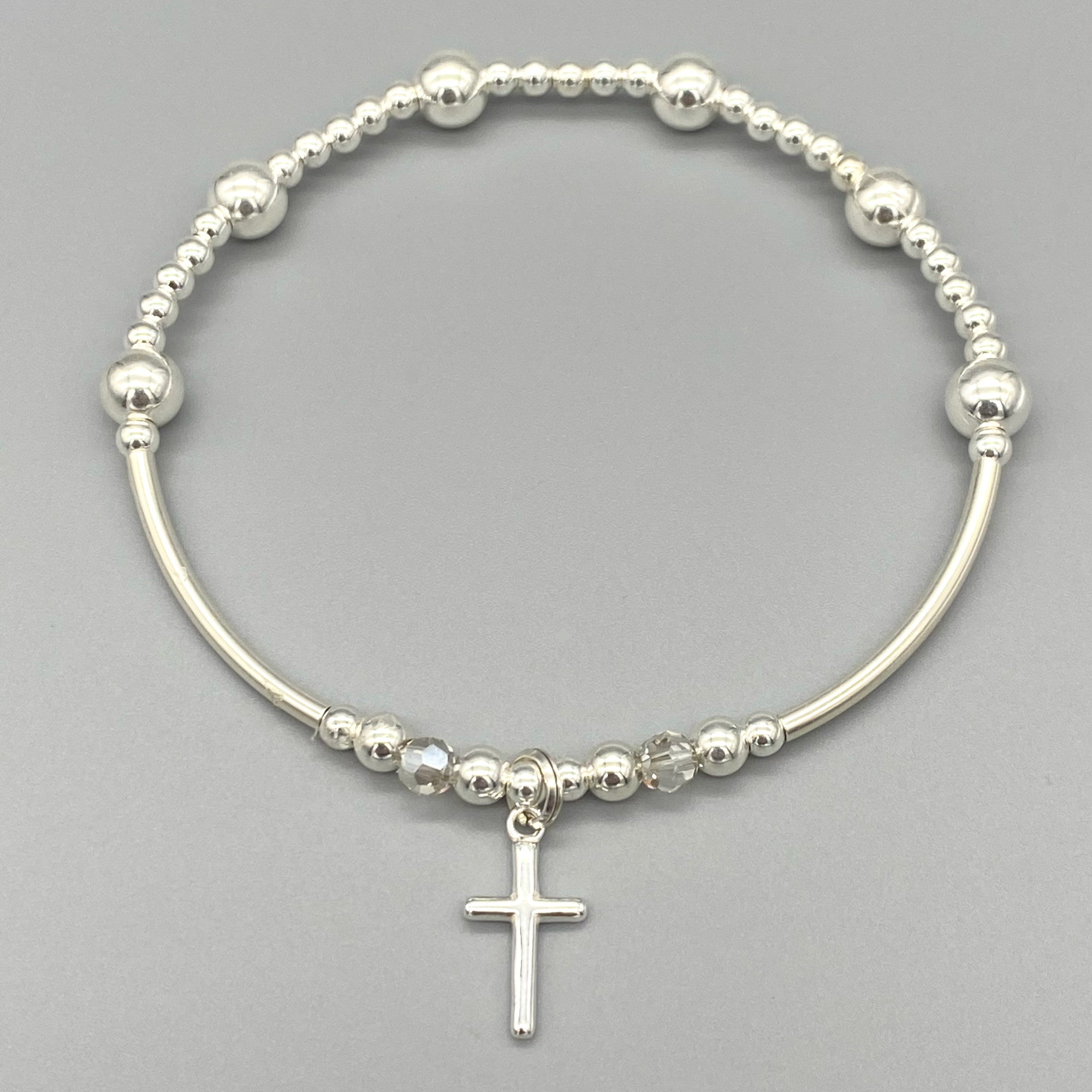 Silver bracelet with hot sale cross charm