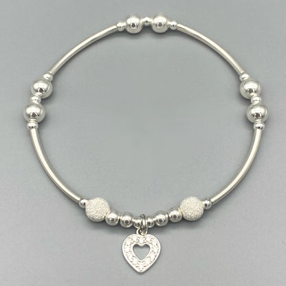 Diamond heart charm and starburst beads women's sterling silver stacking bracelet by My Silver Wish