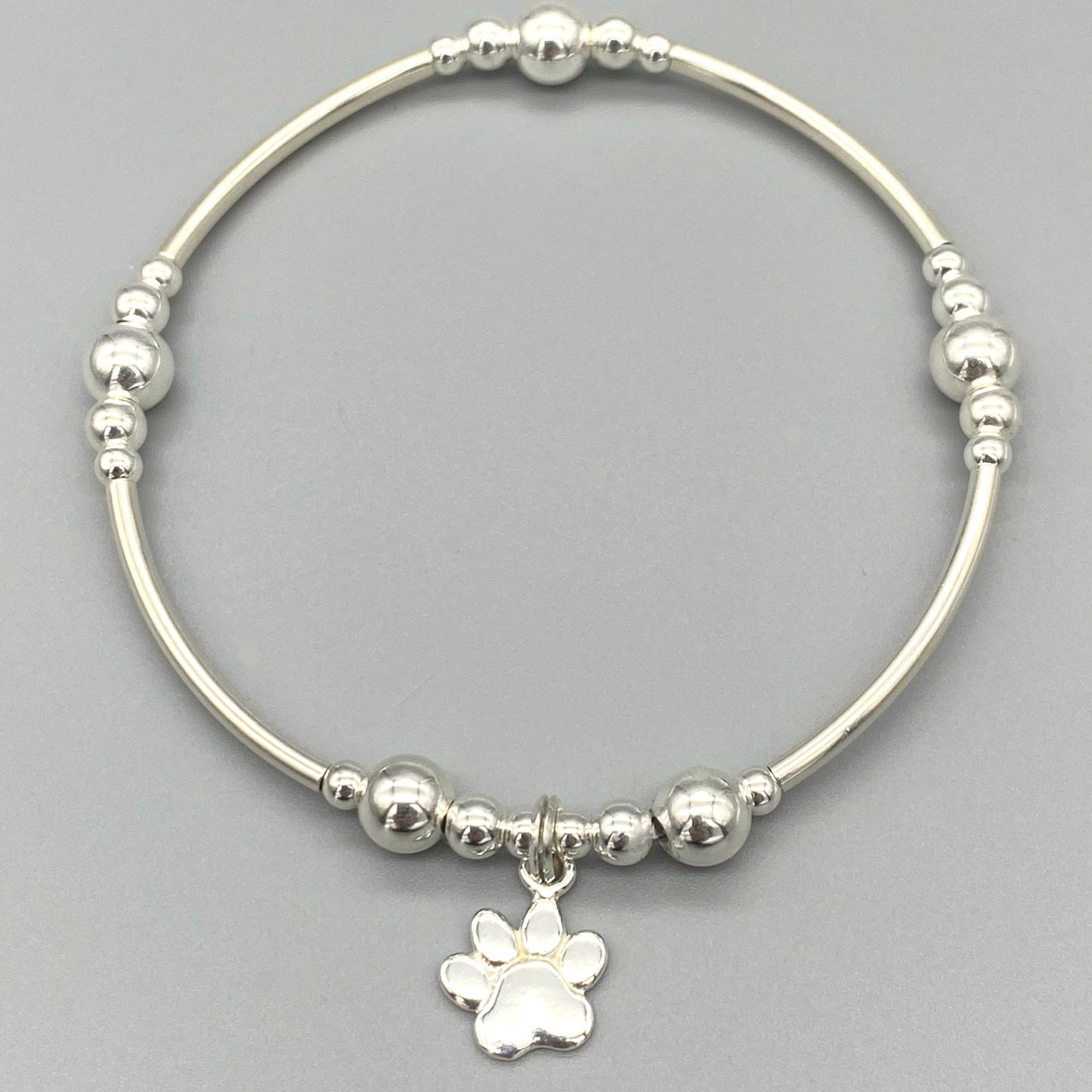 Dog paw charm women's sterling silver stacking bracelet by My Silver Wish