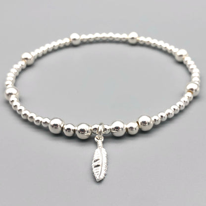 Feather charm girl's 925 sterling silver stacking bracelet by My Silver Wish