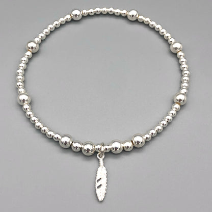 Feather charm women's 925 sterling silver stacking bracelet by My Silver Wish