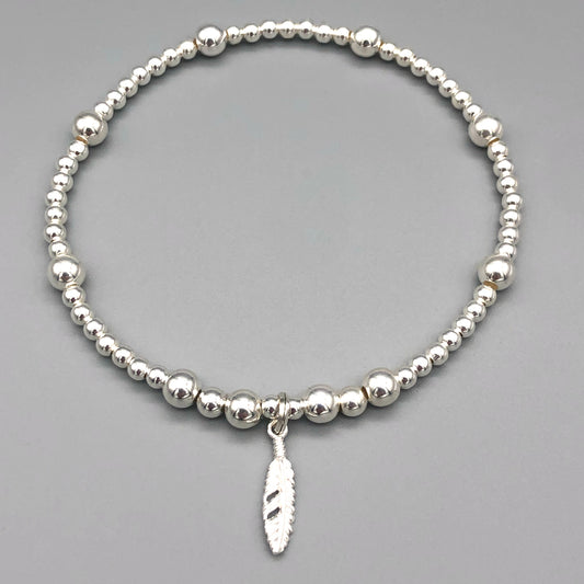 Feather charm girl's 925 sterling silver stacking bracelet by My Silver Wish