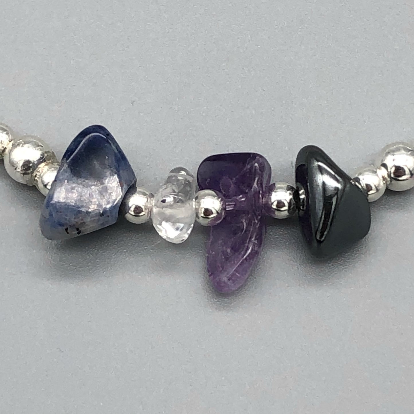 Closeup of Weight loss healing crystal and sterling silver stacking bracelet by My Silver Wish