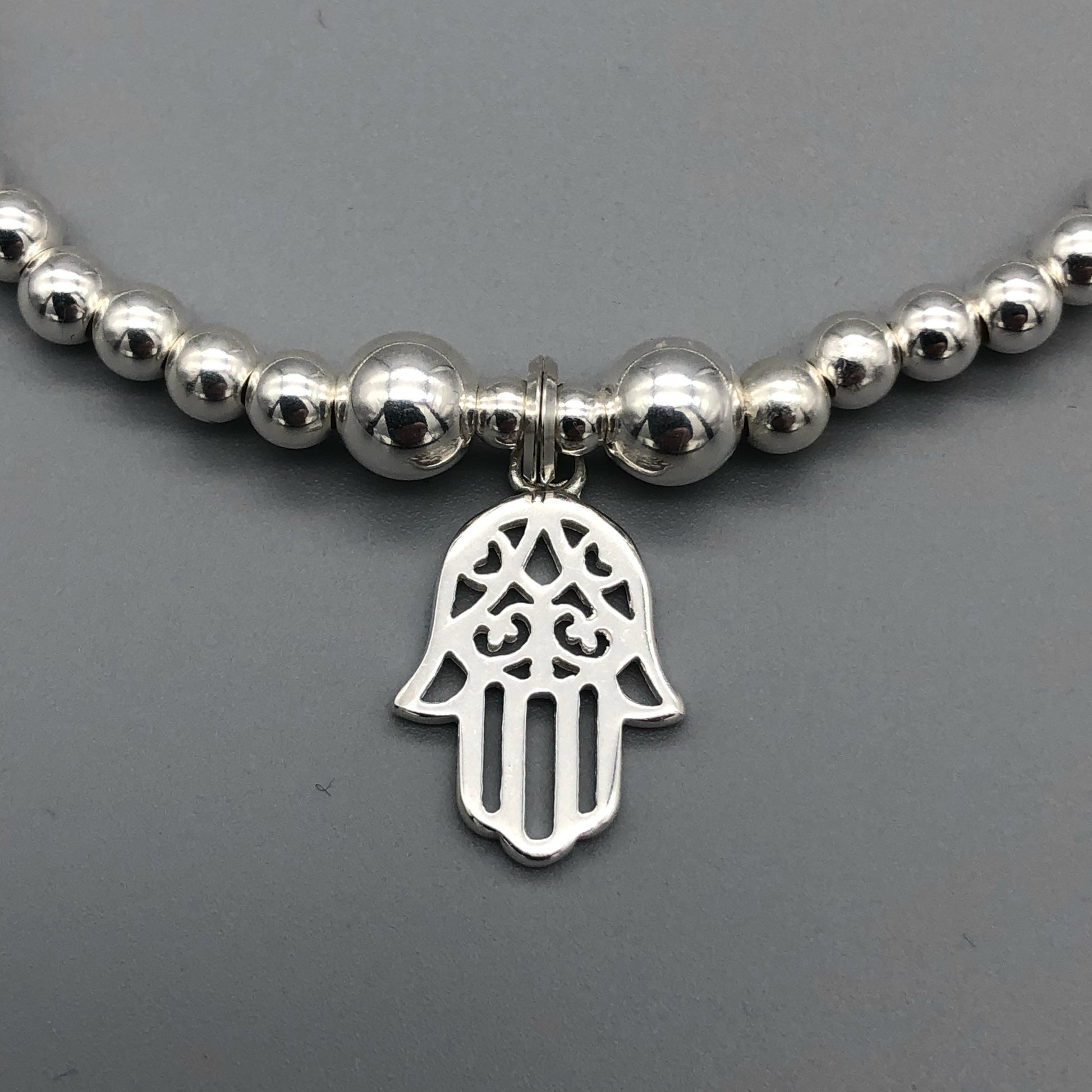 Closeup of Hamsa Hand Charm Women's Sterling Silver Stacking Bracelet by My Silver Wish