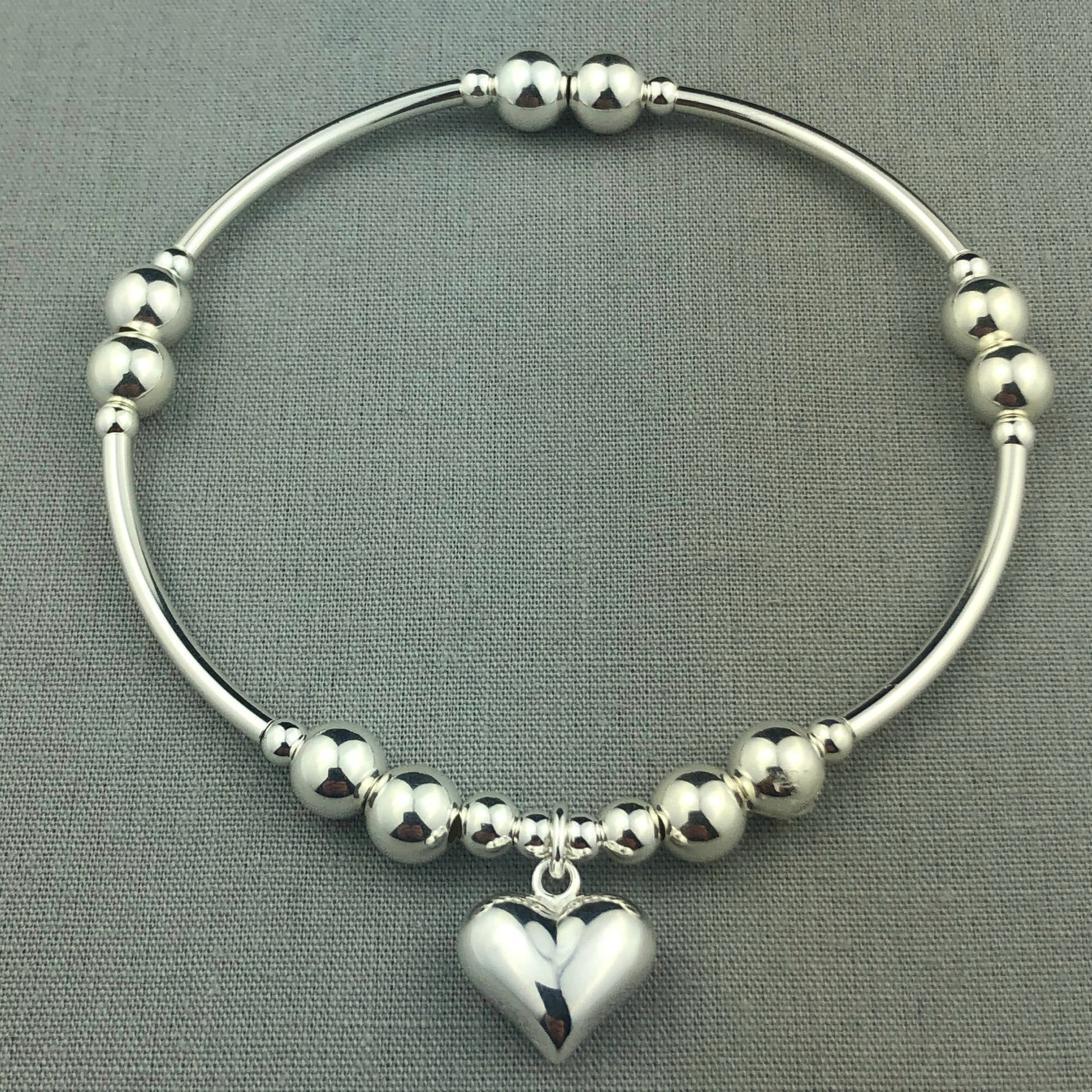 Solid puff heart sterling silver stacking charm bracelet by My Silver Wish