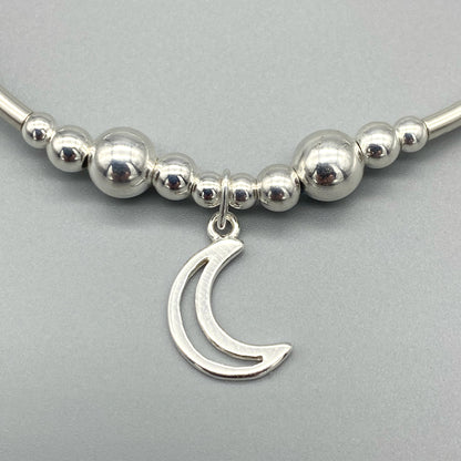 Closeup of Moon charm sterling silver stacking bracelet for her by My Silver Wish