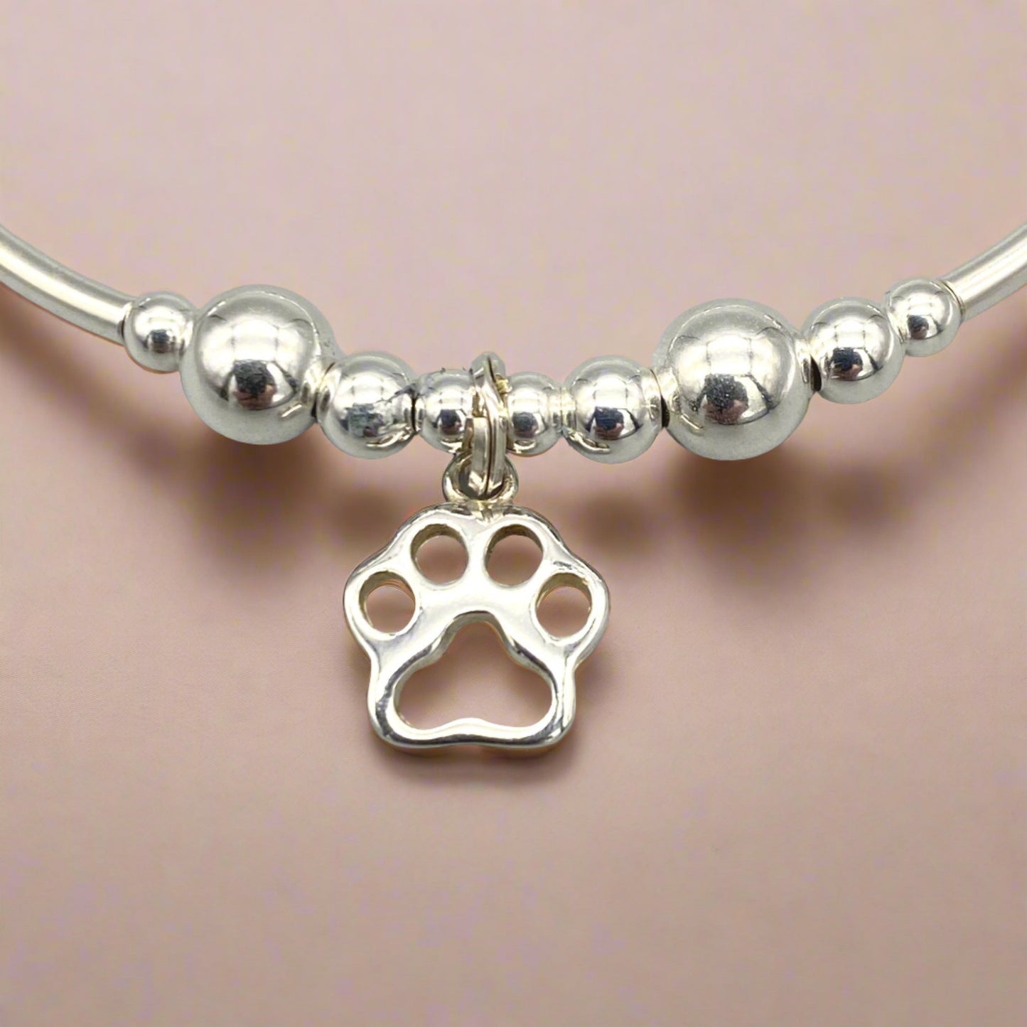 Closeup of Dog Paw Charm Women's Sterling Silver Stacking Bracelet by My Silver Wish