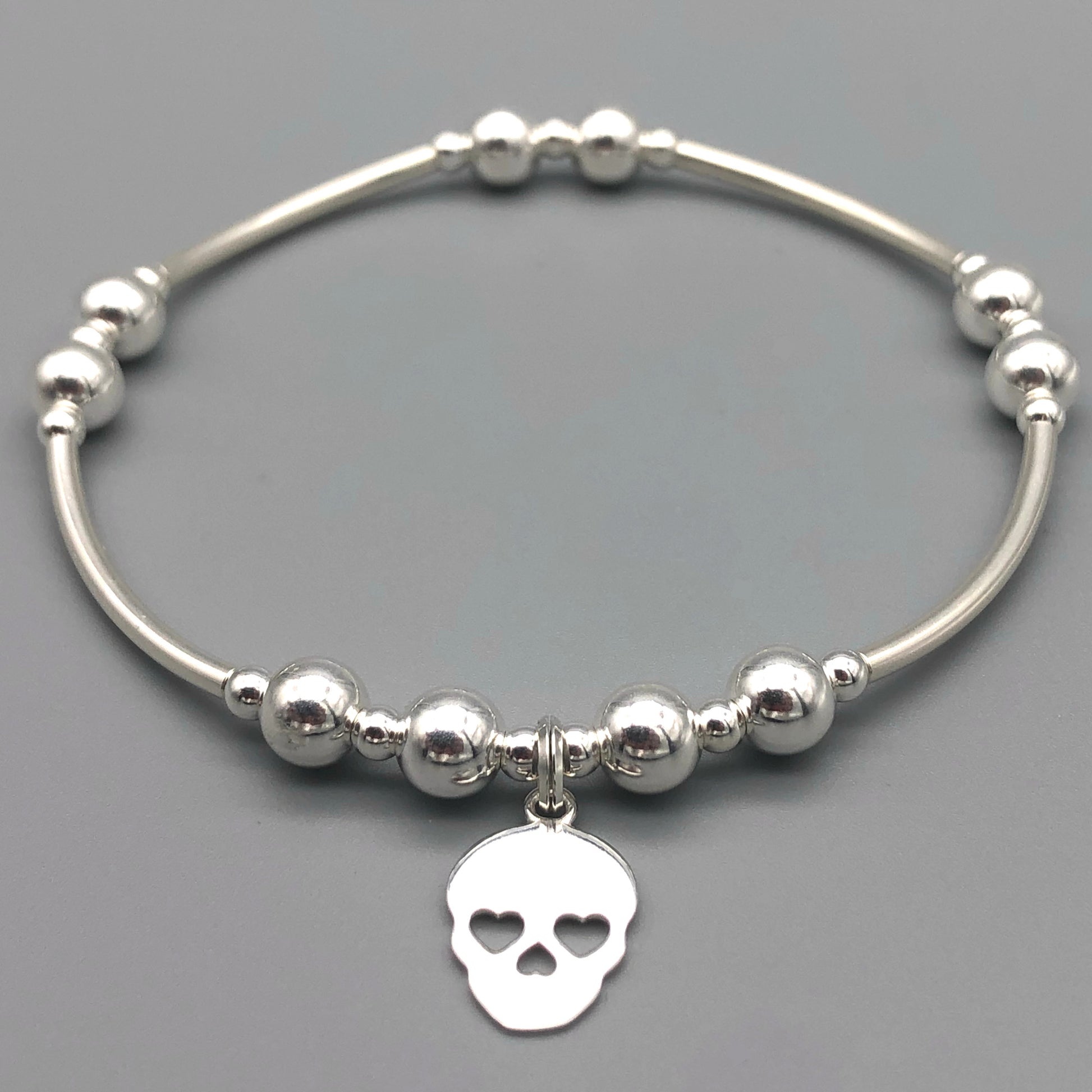 Skull charm sterling silver hand-made women's stacking bracelet by My Silver Wish