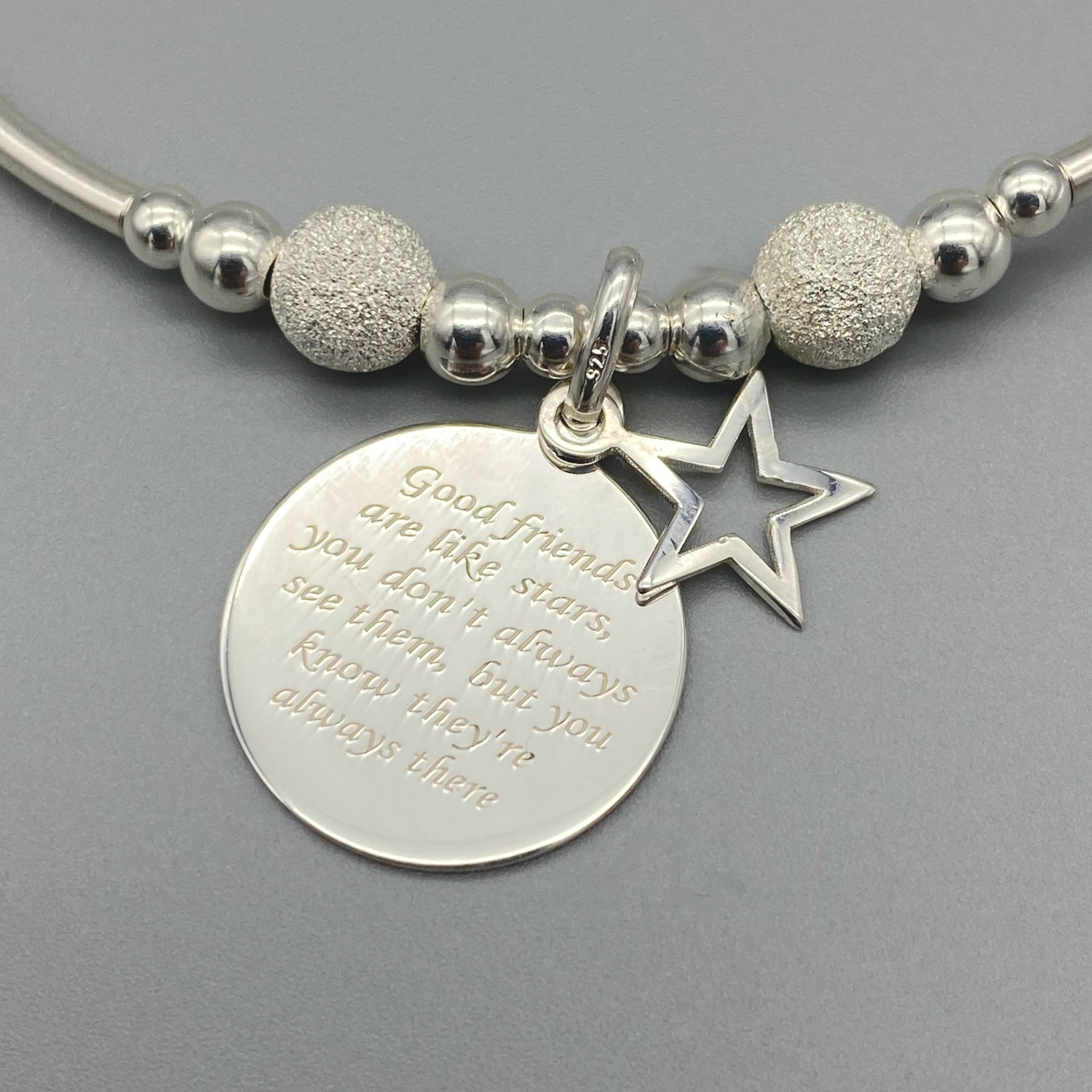 Closeup of "Good friends are like stars..." sterling silver stacking bracelet for her by My Silver Wish
