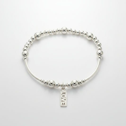 "Love" tag charm sterling silver stacking charm bracelet by My Silver Wish