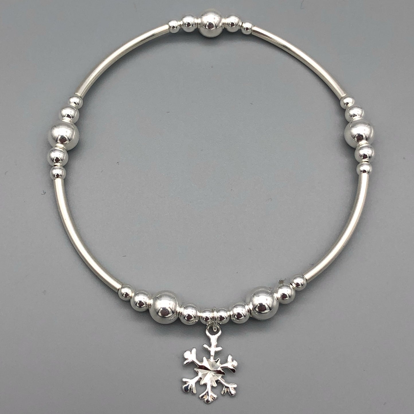 Snowflake charm sterling silver stacking bracelet for her by My Silver Wish