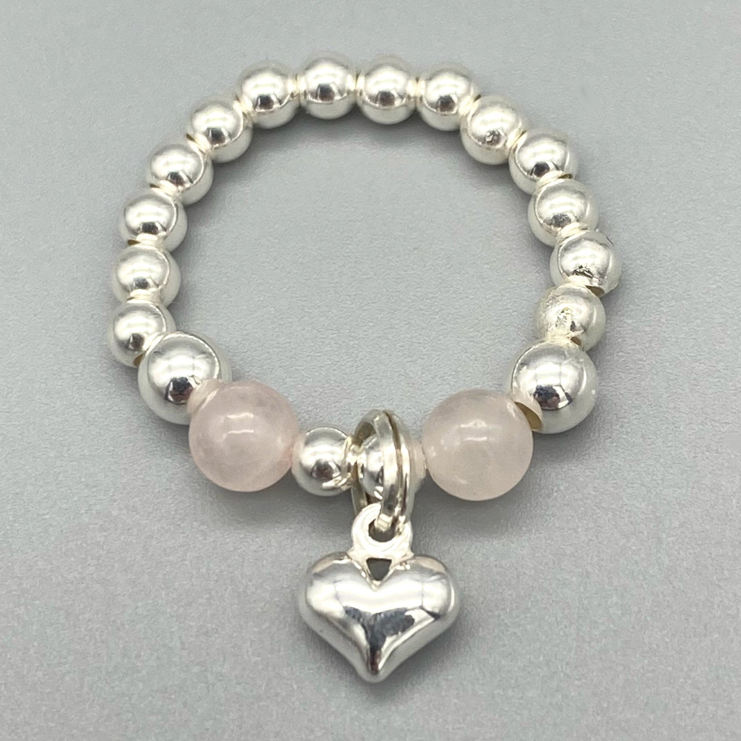 Heart charm & rose quartz healing crystal women's silver stacking ring by My Silver Wish